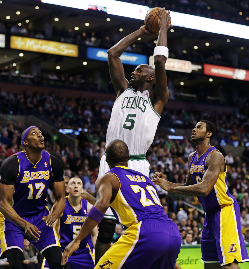 Celtics forward Kevin Garnett still finds a way to tower over his opponents, especially the Los Angeles Lakers, despite the season-ending loss of two valuable teammates.