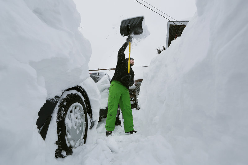 Nate O’Neil shovels out his and his housemates’ cars Saturday in Scarborough after they were buried in snow. The heaviest snowfall reported in the state Saturday was 35.5 inches in Gorham. In other places, Portland got 31.9 inches; South Berwick, 32; Westbrook, 30; Saco, 27; Hollis, 24.5; Otisfield, 24; Richmond, 26.5; and Lewiston had 25.5 inches.