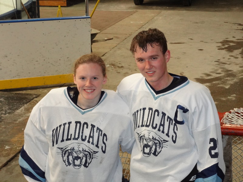 Freshman goalie Jillian Flynn, left, and her senior brother, Adam, are coached by their father, and their Presque Isle team appears headed to the Eastern Class B hockey tournament.