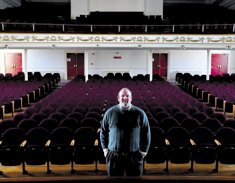 Skowhegan Chamber of Commerce Executive Director Cory King stands inside the Skowhegan Opera House. King says he has a plan to draw more performers.
