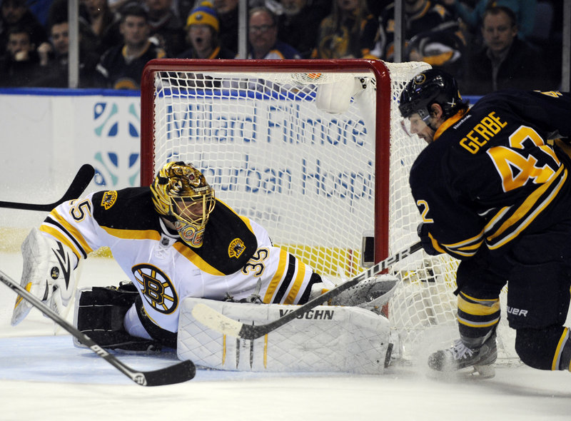 Bruins goaltender Anton Khudobin makes a save on Sabres left winger Nathan Gerbe, a former Portland Pirate, during the first period of Boston’s 3-1 win at Buffalo.