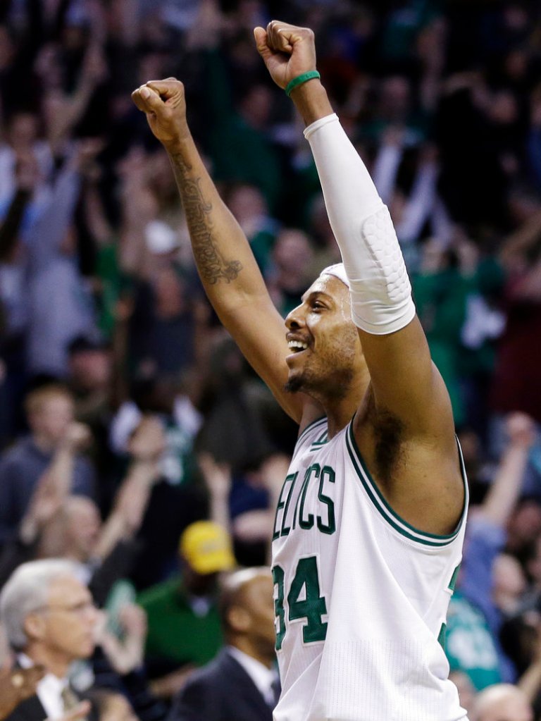 Paul Pierce recorded a triple-double with 27 points, 14 rebounds and 14 assists Sunday to lead the Celtics to a triple-overtime victory against Denver.