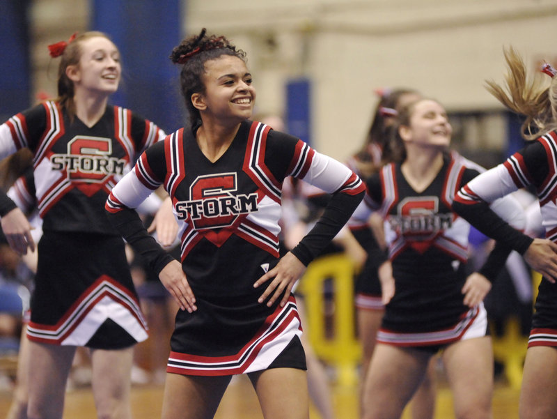 The Scarborough Red Storm cheerleaders, competing in Class A, perform during the state championships at the Bangor Auditorium on Monday. Lewiston won its third straight Class A title.