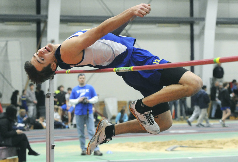 Ian Tait of Falmouth clears the bar in the high jump at 5 feet, 6 inches. Gray-New Gloucester’s Elijah Locke of won the event at 6-0, and Tait placed fifth.