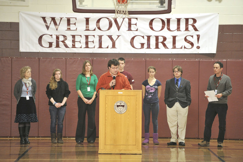 Greely High School held a school-wide assembly in their gym to address biased language and offensive speech in response to an incident last week. Max Bahlkow, a senior and president of Greely's Civil Rights Team, reads a statement to the gathered students during the assembly.