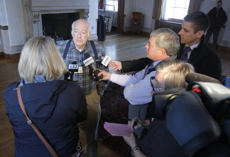 Jeffrey Weinstein, president of the Maine Gun Owners Association, talks with reporters after a news conference at Portland City Hall last month.