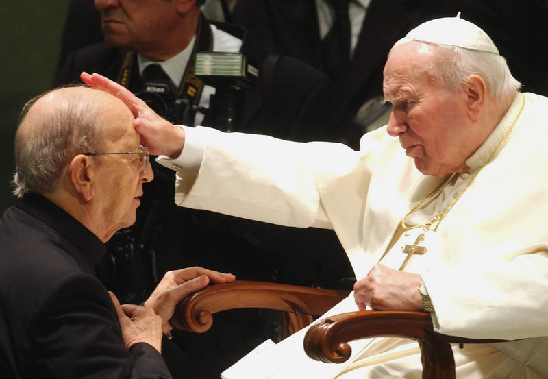 Pope John Paul II gives his blessing to the Rev. Marcial Maciel, founder of the Legion of Christ, at the Vatican in 2004. A Vatican investigation later discredited Maciel.