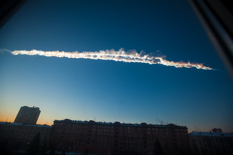 The meteorite leaves a contrail over Chelyabinsk, Russia, on Friday before it exploded. Dozens of witnesses posted photos and videos of the event on the Internet, providing much data for scientists.