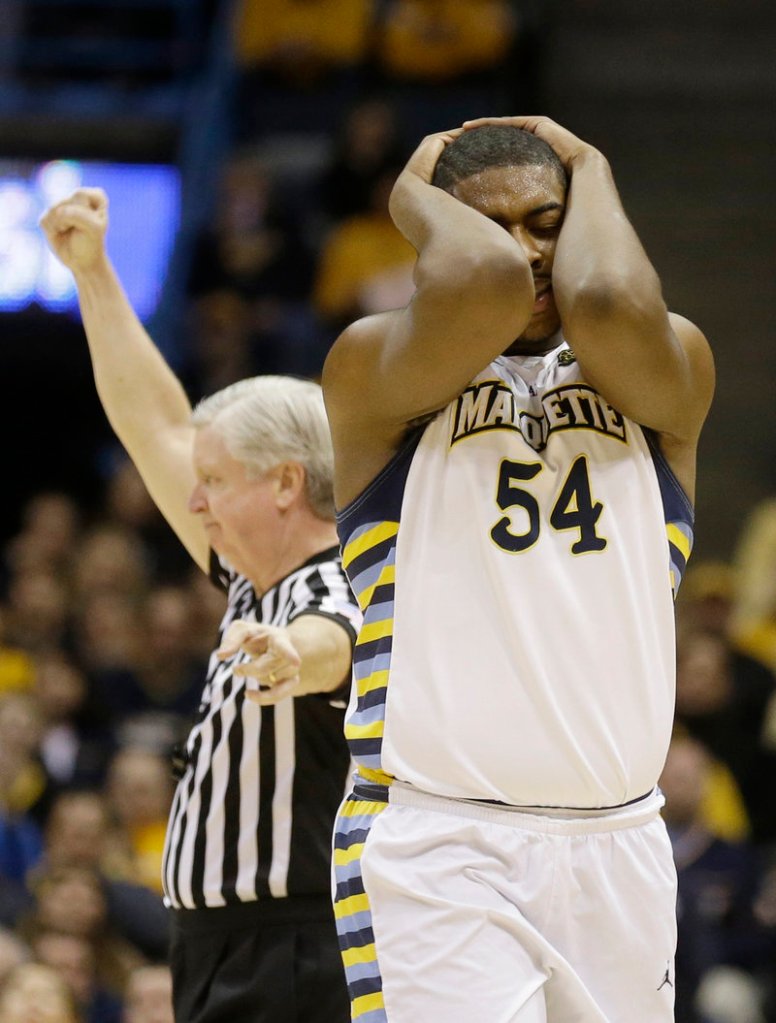 Marquette’s Davante Gardner reacts as he’s called for a foul against Pittsburgh during Saturday’s game in Milwaukee, won by the Golden Eagles, 79-69.