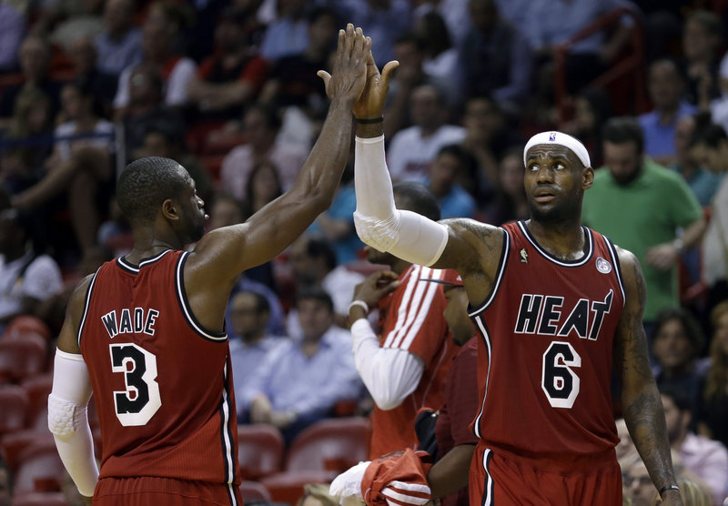 LeBron James, right, and Dwyane Wade have the Miami Heat playing some of their best basketball seven years after the two played in the All-Star game in Houston. Both are back in the city for this year’s All-Star game.