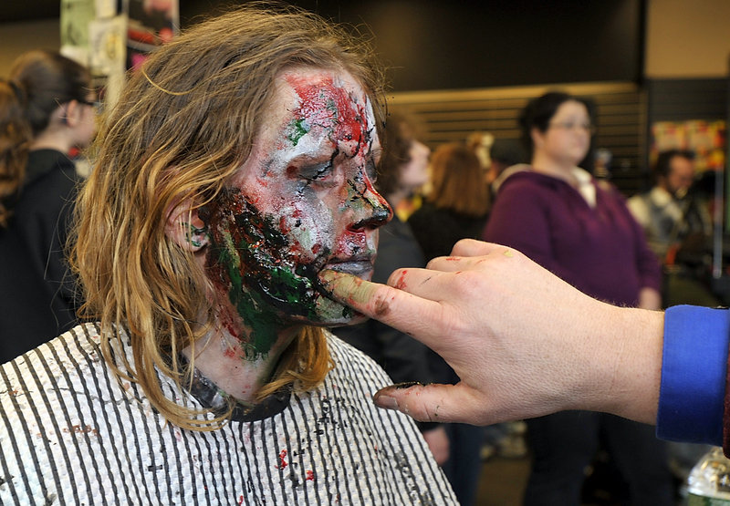 Wengland gets the gruesome treatment during Saturday’s Zombie Blast at Bull Moose in Scarborough.