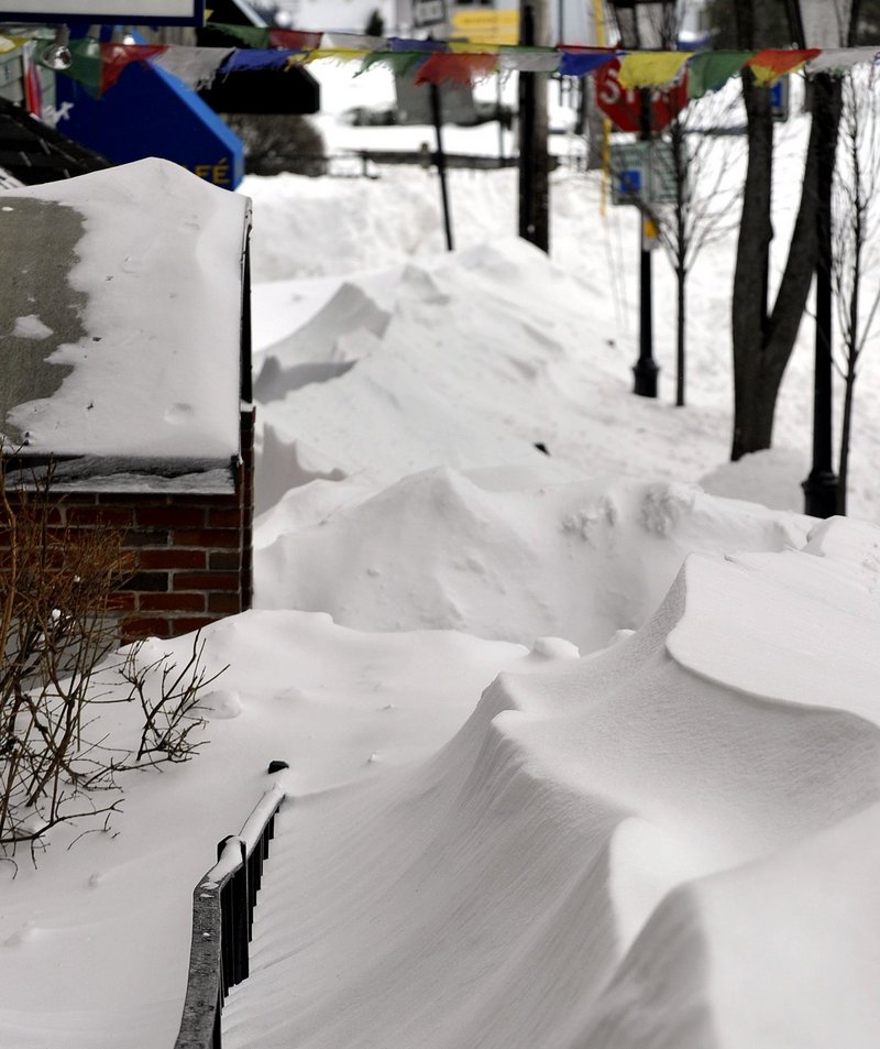 Drifts cover the sidewalk along Moulton Street in Portland on Feb. 9, making it impassable following the Blizzard of 2013. After the storm, city firefighters took to the streets to dig out nearly 2,000 fire hydrants, a reader says.