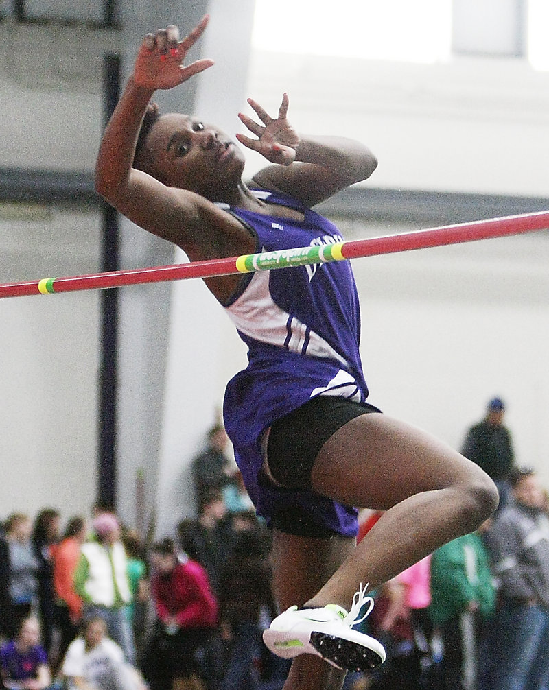 Rashad Zagon of Deering keeps her concentration while competing in the Class A high jump. She finished fifth with a height of 5 feet.