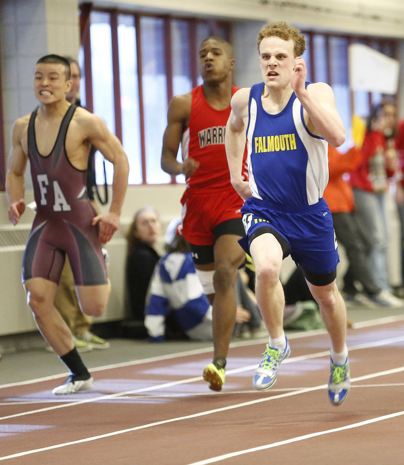 Jacob Buhelt of Falmouth surges to the finish line to win the Class B 200 meters in 23.23 seconds.