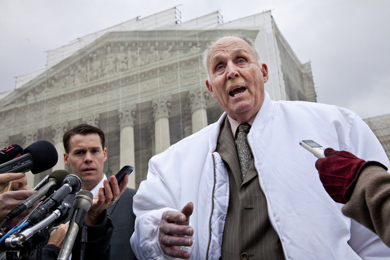 Vernon Hugh Bowman, 75, an Indiana soybean farmer, speaks with reporters outside the Supreme Court on Tuesday.