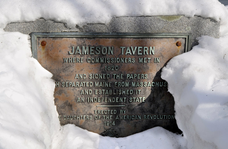 A plaque on the exterior of Jameson Tavern in Freeport claims "commissioners met in 1820" at the tavern to sign papers to separate from Massachusetts. That story and Freeport's town motto are a myth, experts say.