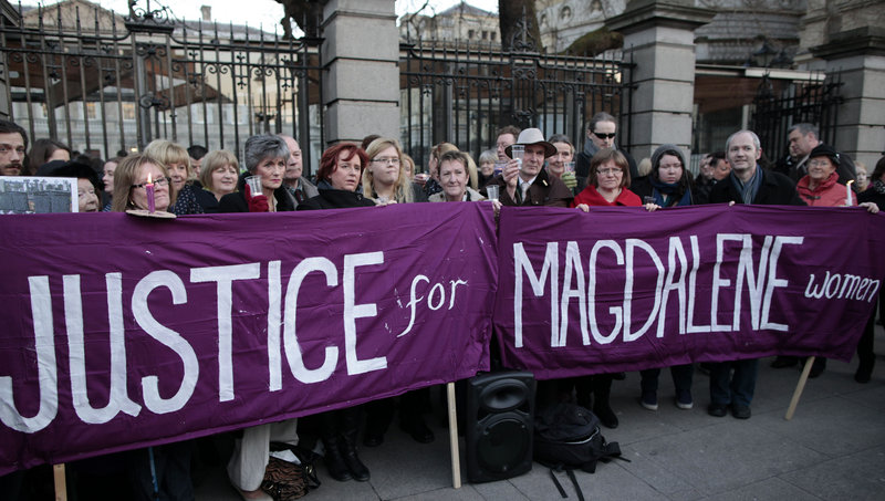 Relatives of victims of the Magdalene Laundries – where women branded “fallen” were consigned – hold a vigil Tuesday in Dublin.