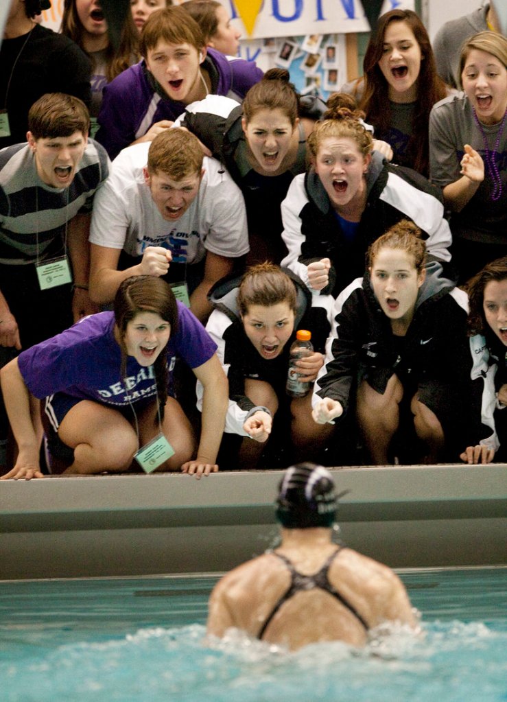 Genna Worthley is cheered on by her Deering High supporters. Worthley won the 200 individual medley and 100 breast stroke. She also was on the 200 medley relay team that placed second.