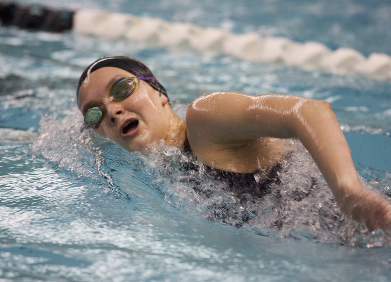 Lynsie Russell of Brunswick heads to the finish while competing in the grueling 500-yard freestyle. Russell, a freshman, won the event in 5 minutes, 25.64 seconds -- exactly 13 seconds ahead of the runner-up, Alyssa Reardon of Bangor.