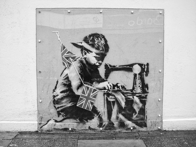This stencil by the British graffiti artist Banksy, which vanished from the side of a London store, is expected to bring $500,000-$700,000 at an auction Saturday.