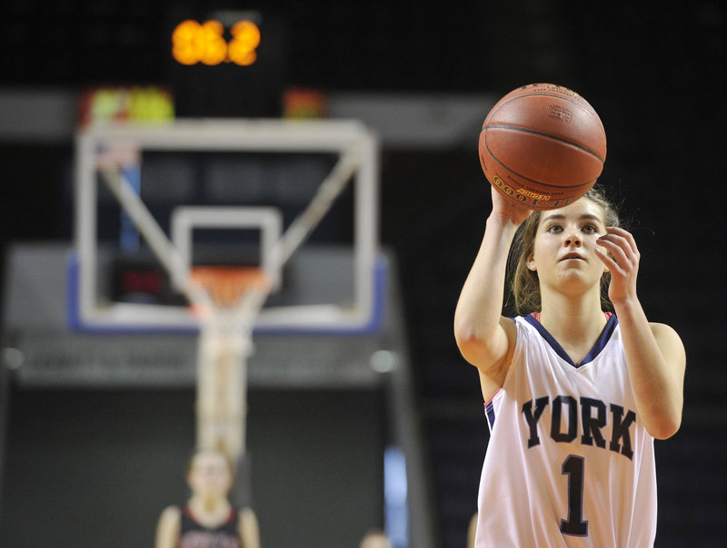 Ruby Cribby of York keeps her focus while hitting two late foul shots Thursday, points that proved decisive as the Wildcats beat Wells 40-38 at the Cumberland County Civic Center to reach the Western Class B final Saturday.