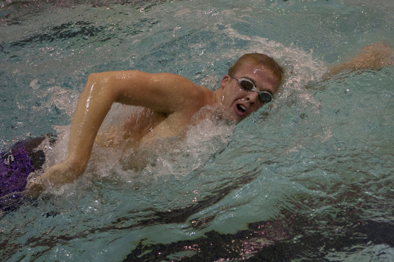 Andrew Marshall of Kittery, a senior at St. Michael’s College, set three school records in freestyle races at the New England Intercollegiate Swimming & Diving Association championships.