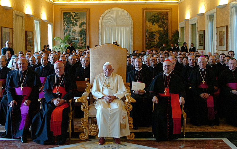 This 2006 photo shows Pope Benedict XVI at a meeting with outgoing Vatican Secretary of State Cardinal Angelo Sodano, left, and the current No. 2 official, Cardinal Tarcisio Bertone, right. Many think the next pontiff must have a solid track record managing a complicated bureaucracy.
