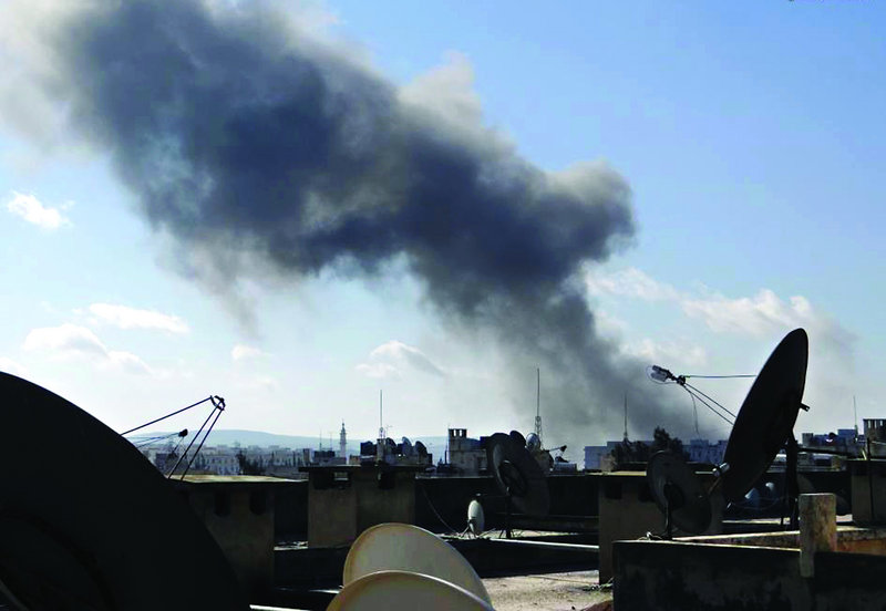 Smoke rises from heavy shelling in Syria’s largest city, Aleppo, on Tuesday in this citizen journalism image provided by Aleppo Media Center AMC, which has been authenticated based on its contents and other reporting.