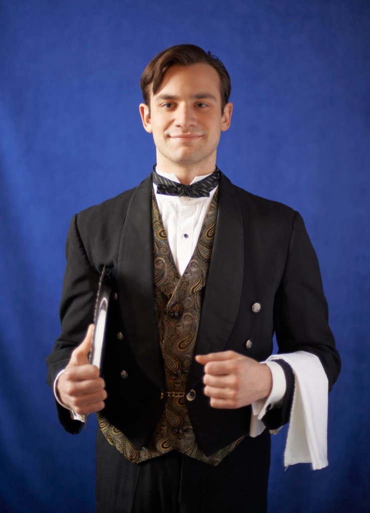 Harrison M. Beck portrays Felix, the floor waiter at the Beau Rivage Hotel, the setting for Noel Coward’s “A Song at Twilight.”