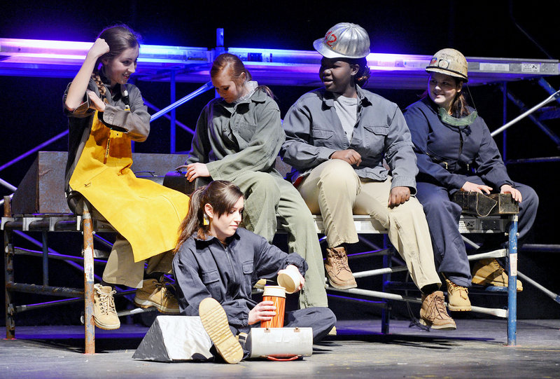 Deering High School students act out a scene depicting women working at the South Portland Shipyard during rehearsal of their one act play "Tribute". From left to right: Lillian Ham, Brittany Burke, Nancy Umba, Tori Grey and sitting is Natalie Veilleux on Tuesday, Feb. 26, 2013.