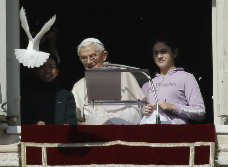 Pope Benedict XVI greets pilgrims in St. Peter’s Square at the Vatican on Wednesday for the last time before retiring. Thousands turned out to see him.