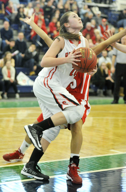 Ashley Briggs of Scarborough heads to the basket during the 45-32 victory over South Portland.