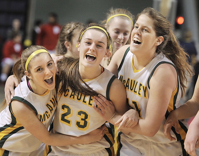 Been there, done that and still loving it as McAuley won its third straight Western Class A title Saturday night by beating Cheverus. Leading the celebration is Allie Clement, flanked by Sarah Clement, left, and Molly Mack.