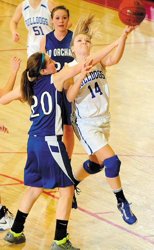 Christina Colman, left, of Old Orchard Beach fouls Cristie Vicneire of Madison at the Augusta Civic Center.