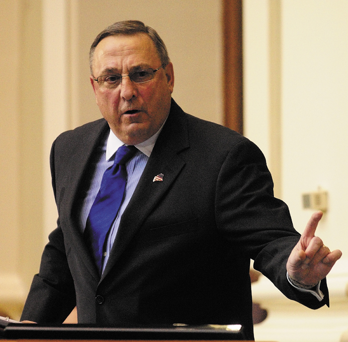 Gov. Paul LePage gestures while giving the State of the State address on Tuesday, Feb. 5, 2013 at the State House in Augusta.
