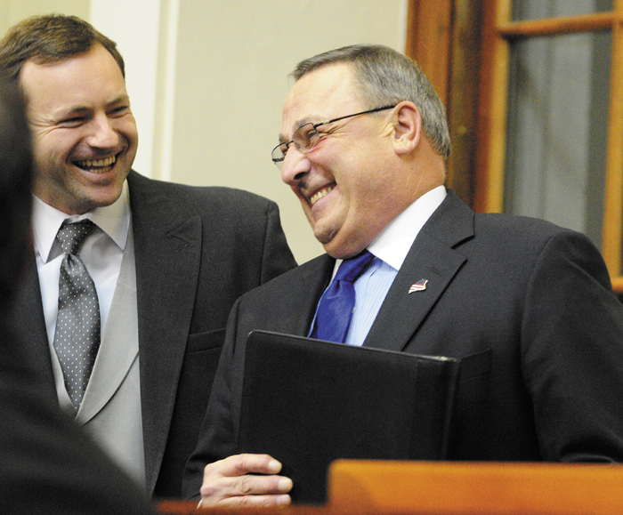 Speaker of the House Mark W. Eves, D-North Berwick, left, chats with Gov. Paul LePage before the governor gives the State of the State address on Tuesday February 5, 2013 in the State House in Augusta.
