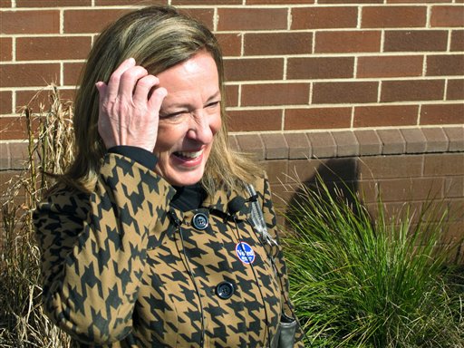 Elizabeth Colbert Bush, the sister of comedian Stephen Colbert, talks to reporters after voting in Mount Pleasant, S.C., on Tuesday.