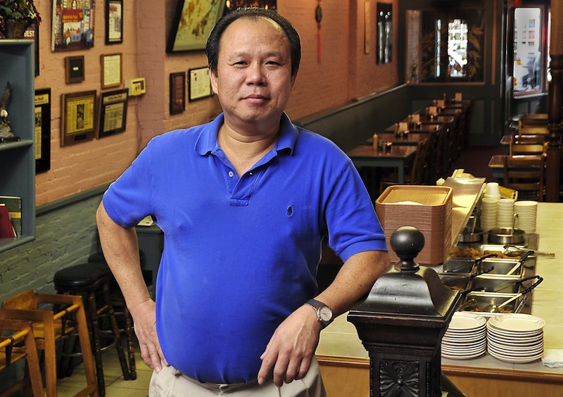 In this October 2010 file photo, Monday, a portrait of Yan Lam, owner of the Oriental Table at 106 Exchange St. in Portland. The longtime local eatery is closing its doors at the end of the month, and its future is uncertain.