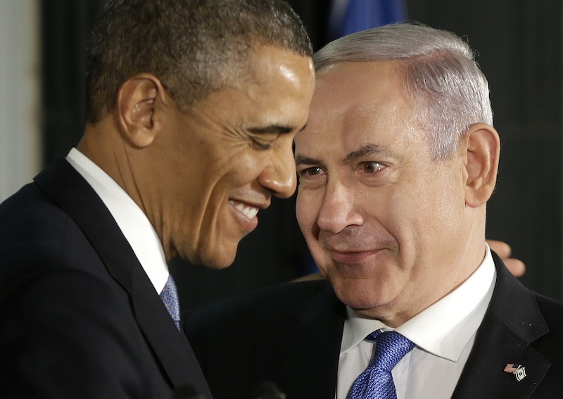 President Barack Obama and Israeli Prime Minister Benjamin Netanyahu huddle during their joint news conference in Jerusalem, Israel, Wednesday, March 20, 2013. (AP Photo/Pablo Martinez Monsivais)