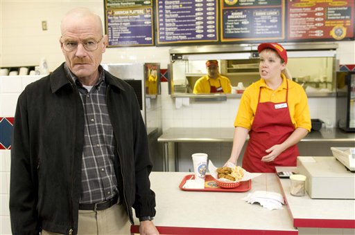 This image released by AMC shows Bryan Cranston as Walter White at the fictional restaurant "Los Pollos Hermanos" in a scene from season 2 of the AMC series "Breaking Bad." A Twisters burrito restaurant in Albuquerque that serves as the location for the restaurant has become an international tourist attraction.