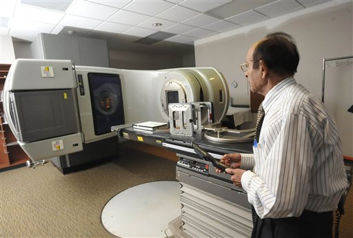 This Sept. 19, 2102, photo shows a linear accelerator used to treat cancer at a hospital in Johnstown, Pa. A new study shows radiation can hurt arteries, making them prone to harden and clog and cause a heart attack.