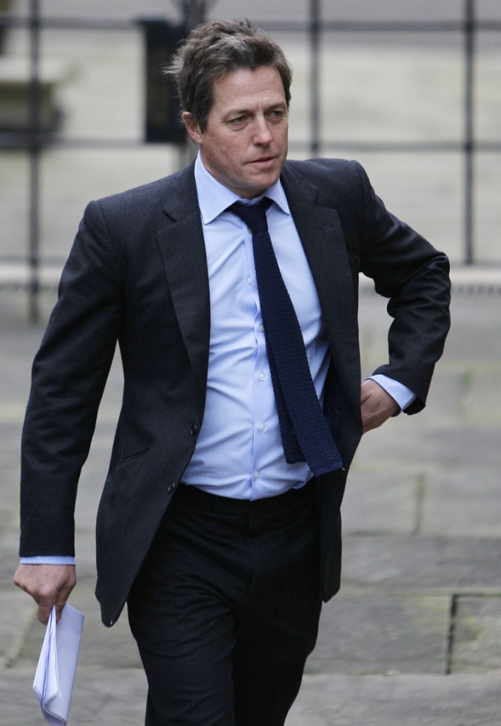 Actor Hugh Grant arrives in London on Nov. 21, 2011, to give evidence at the Leveson inquiry into media ethics and investigative journalism following the phone hacking scandal. Celebrities including Grant and author J.K. Rowling are urging lawmakers to back new measures to rein in Britain's unruly press.