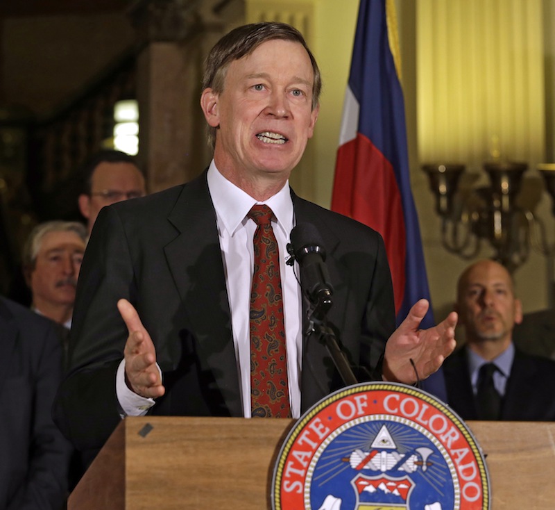 Colorado Gov. John Hickenlooper speaks at a news conference at the Capitol in Denver on Wednesday, March 20, 2013, where he talks about the shooting death of Tom Clements, the executive director of the Department of Corrections, who was shot and killed when he answered the front door of his house Tuesday night, in Monument, Colo. Police are searching for the gunman and trying to figure out if the attack had anything to do with his position. (AP Photo/Ed Andrieski)