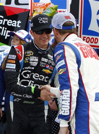 Kasey Kahne is congratulated by Dale Earnhardt Jr. after winning the NASCAR Sprint Cup Series auto race Sunday in Bristol, Tenn.