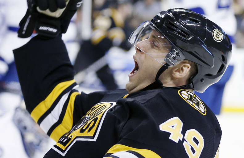 Rich Peverley of the Bruins celebrates his second-period Saturday against the Tampa Bay Lightning in Boston on Saturday. The Bruins won, 3-2.