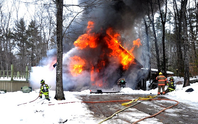 Fire destroyed a log home at 600 Naples Road in Harrison on Sunday afternoon. One person was injured in the blaze.
