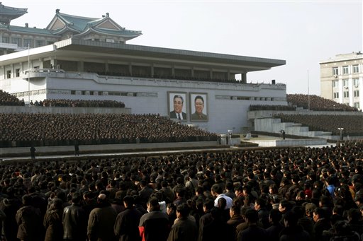 North Koreans attend a rally in Kim Il Sung Square in Pyongyang, North Korea, on Thursday. North Korea on Thursday amplified its threatening rhetoric hours ahead of a vote by U.N. diplomats on whether to level new sanctions against Pyongyang for its recent nuclear test.