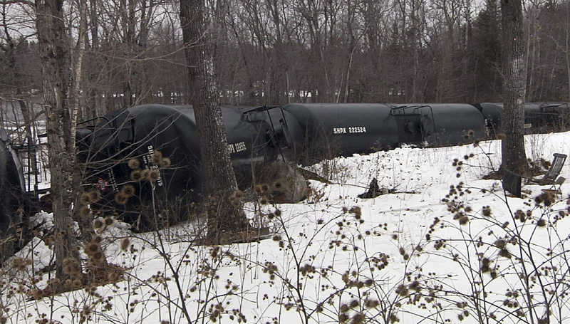 This March 7 photo, provided by WABI-TV5 in Bangor, shows derailed tank cars in Mattawamkeag. Fifteen cars of a 96-car train carrying crude oil went off the tracks at about 5 a.m., about 60 miles north of Bangor.