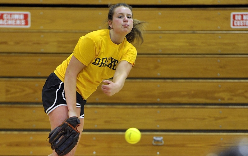 Alyssa Williamson, a junior, fires one of many pitches on the first official day of softball practice at Scarborough High School.