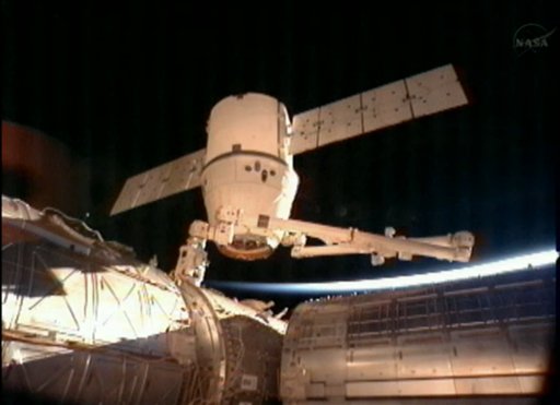 This image provided by NASA-TV shows the SpaceX Dragon commercial cargo craft after it was detached from the International Space Station early Tuesday by the International Space Station's Canadarm2 robotic arm. The Dragon is expected to splash down in the eastern Pacific ocean approximately 246 miles off the coast of Baja Calif., later today.